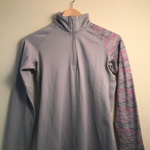 gray patterned Nike sweater